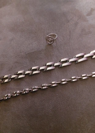 2stalen armbanden en een zilveren ring, staat: Heel goed, € 15,00, € 16,45 inclusief Kopersbescherming