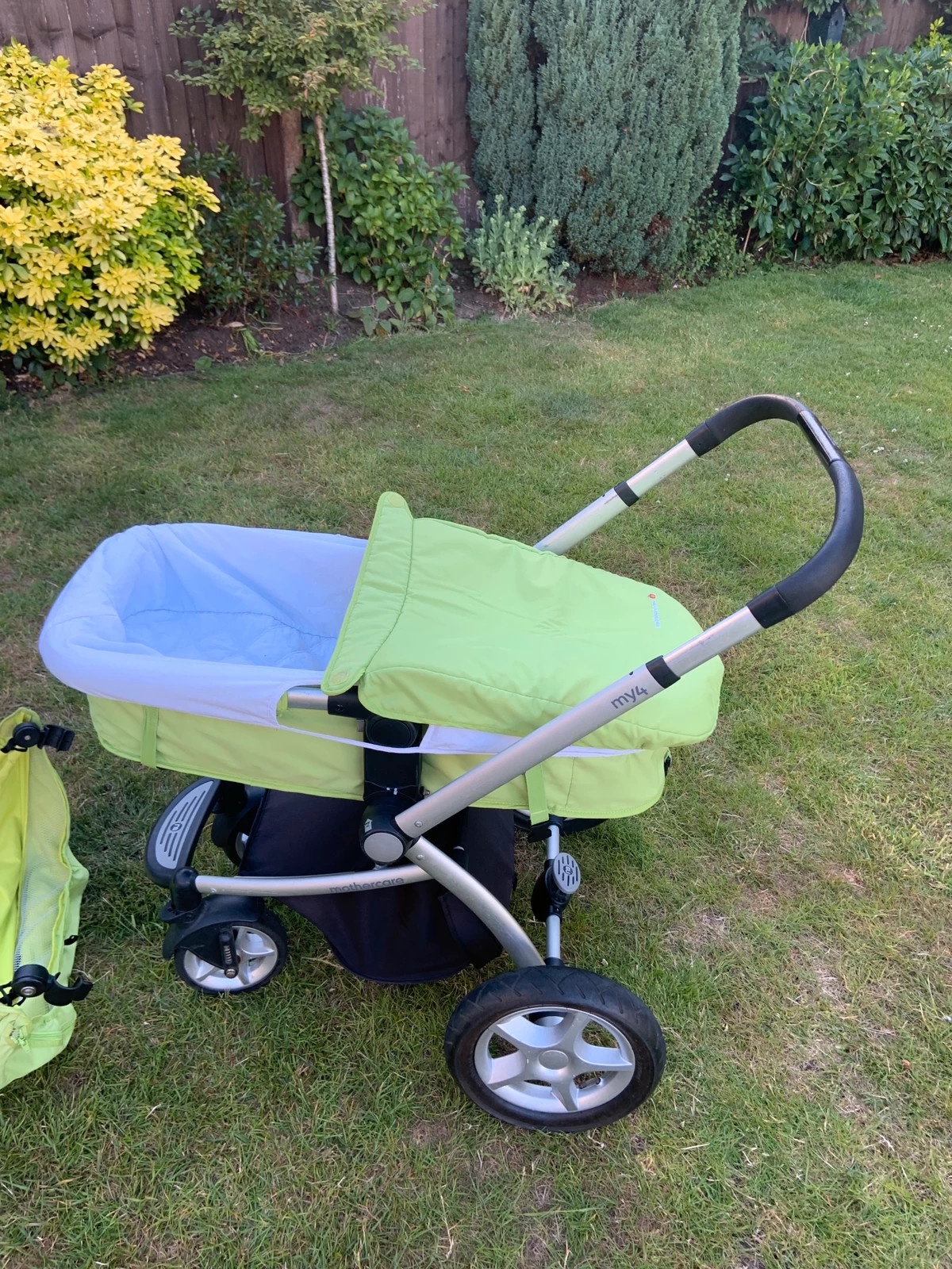 Khaki green top mothercare pram