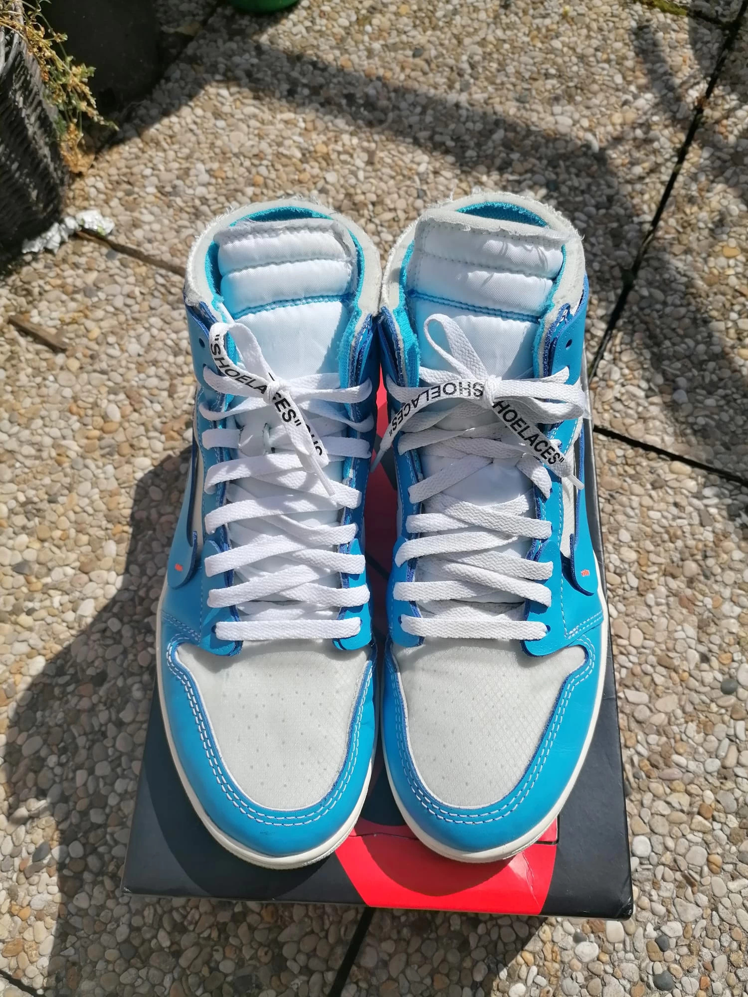 Nike air jordan 1 unc x off white sales