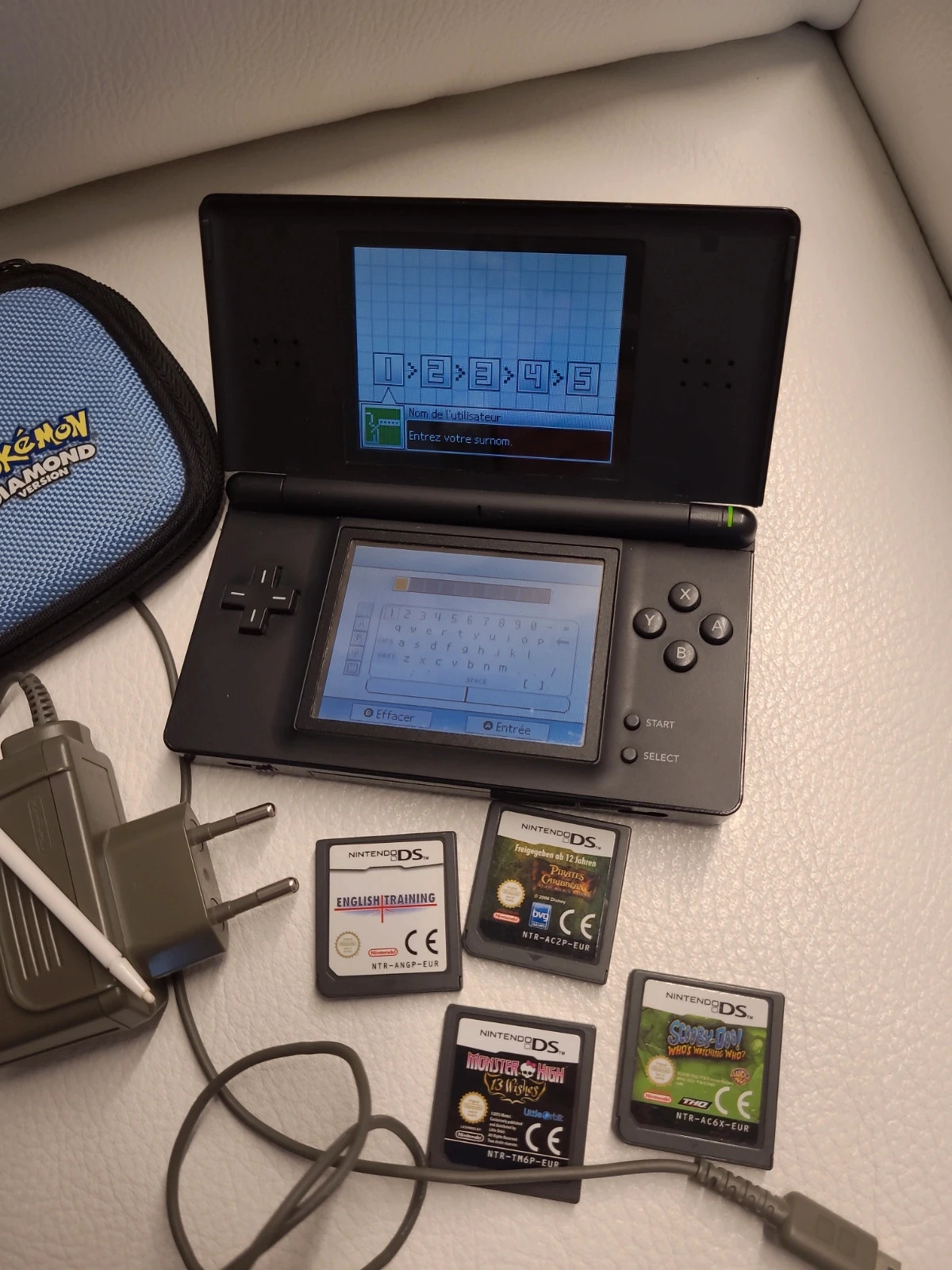 Nintendo DS Lite en bon état et 4 jeux | Vinted