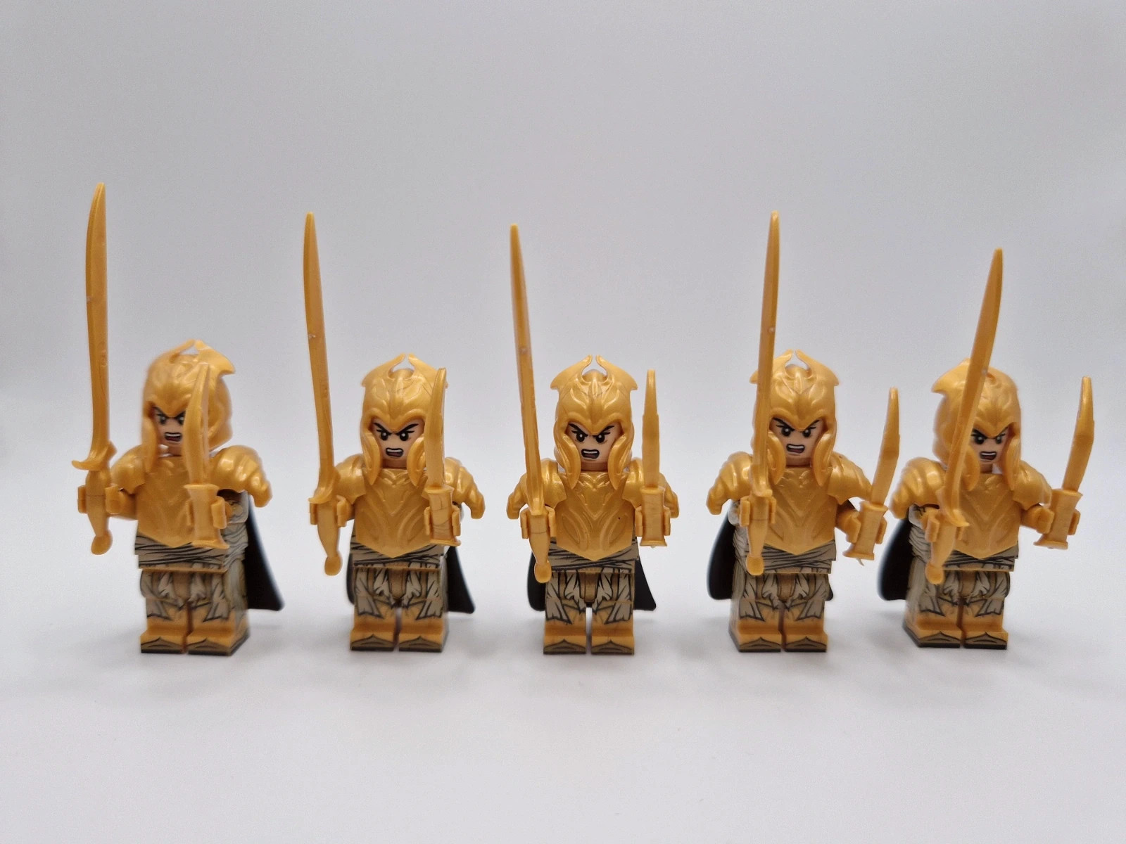 Figurines type lego 4 guerriers elfes seigneur des anneaux