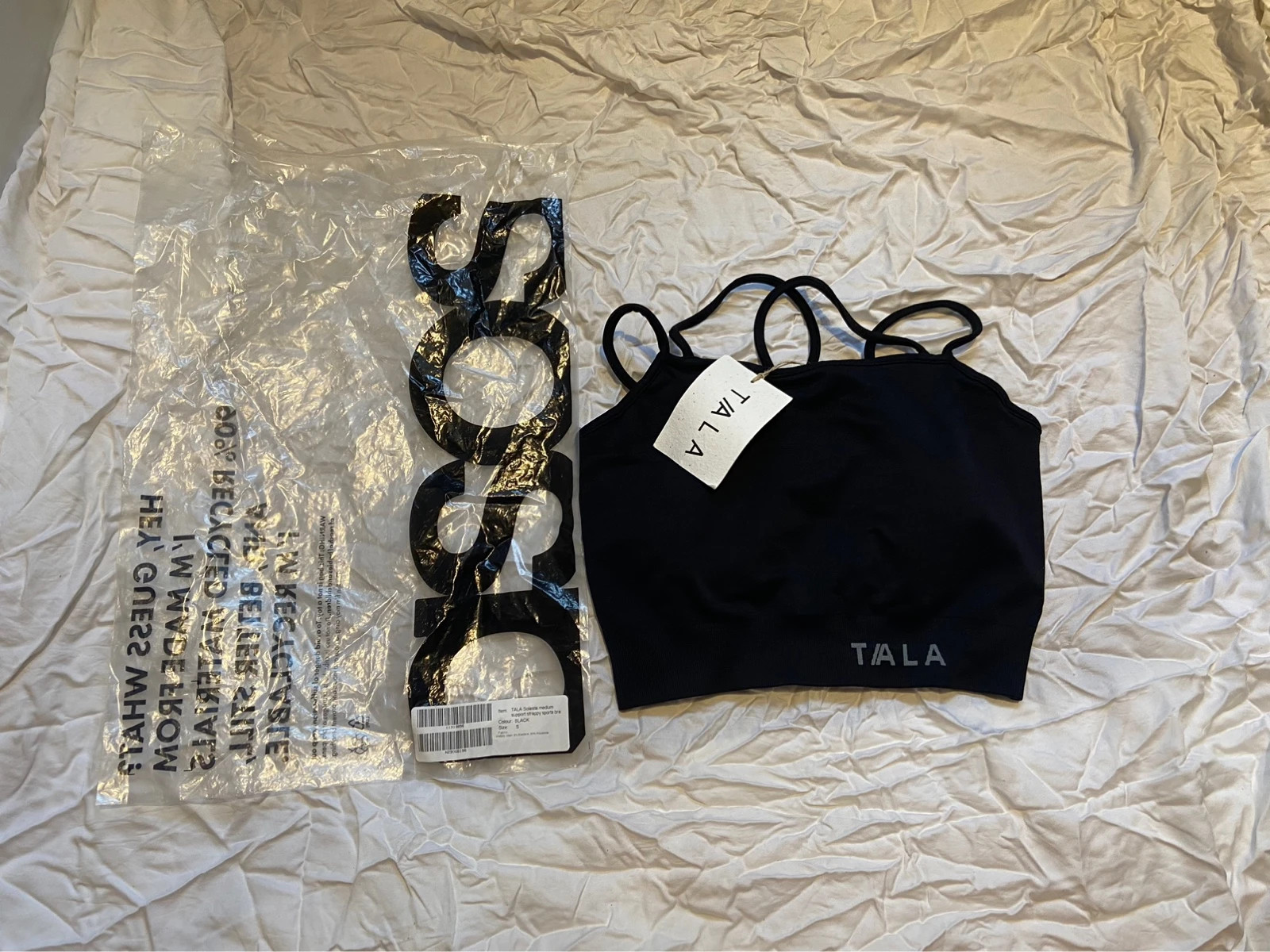 Small black TALA sports bra / crop top, Solasta seamless