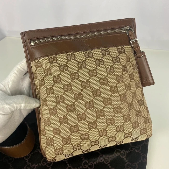 Gucci monogram sling outlet bag