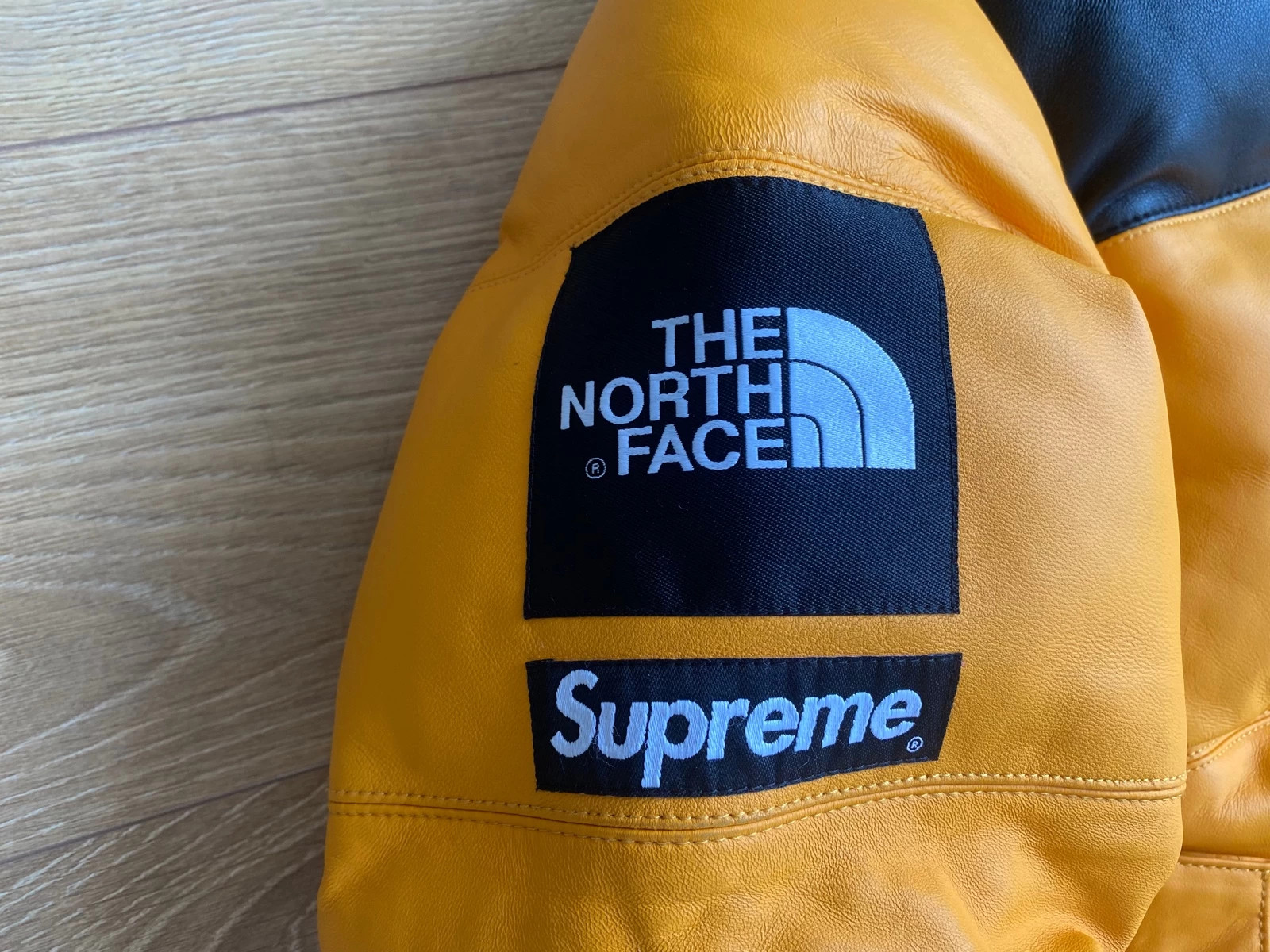 Supreme the north face sale leather nuptse jacket yellow