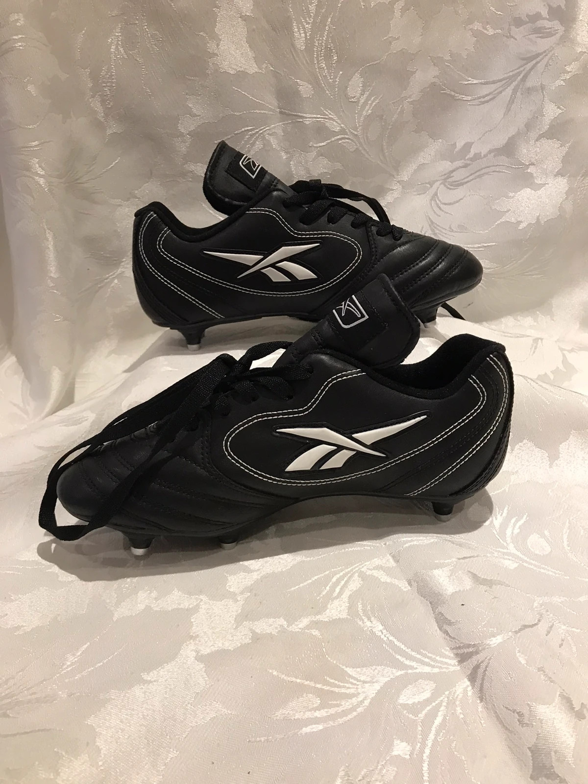 Reebok football cleats discount