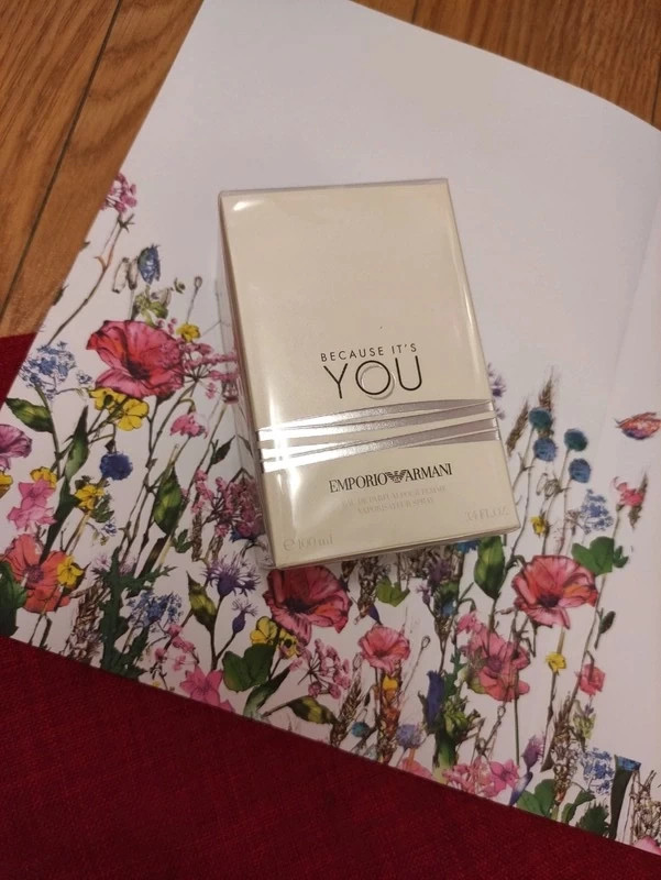 Armani because it's you top for her