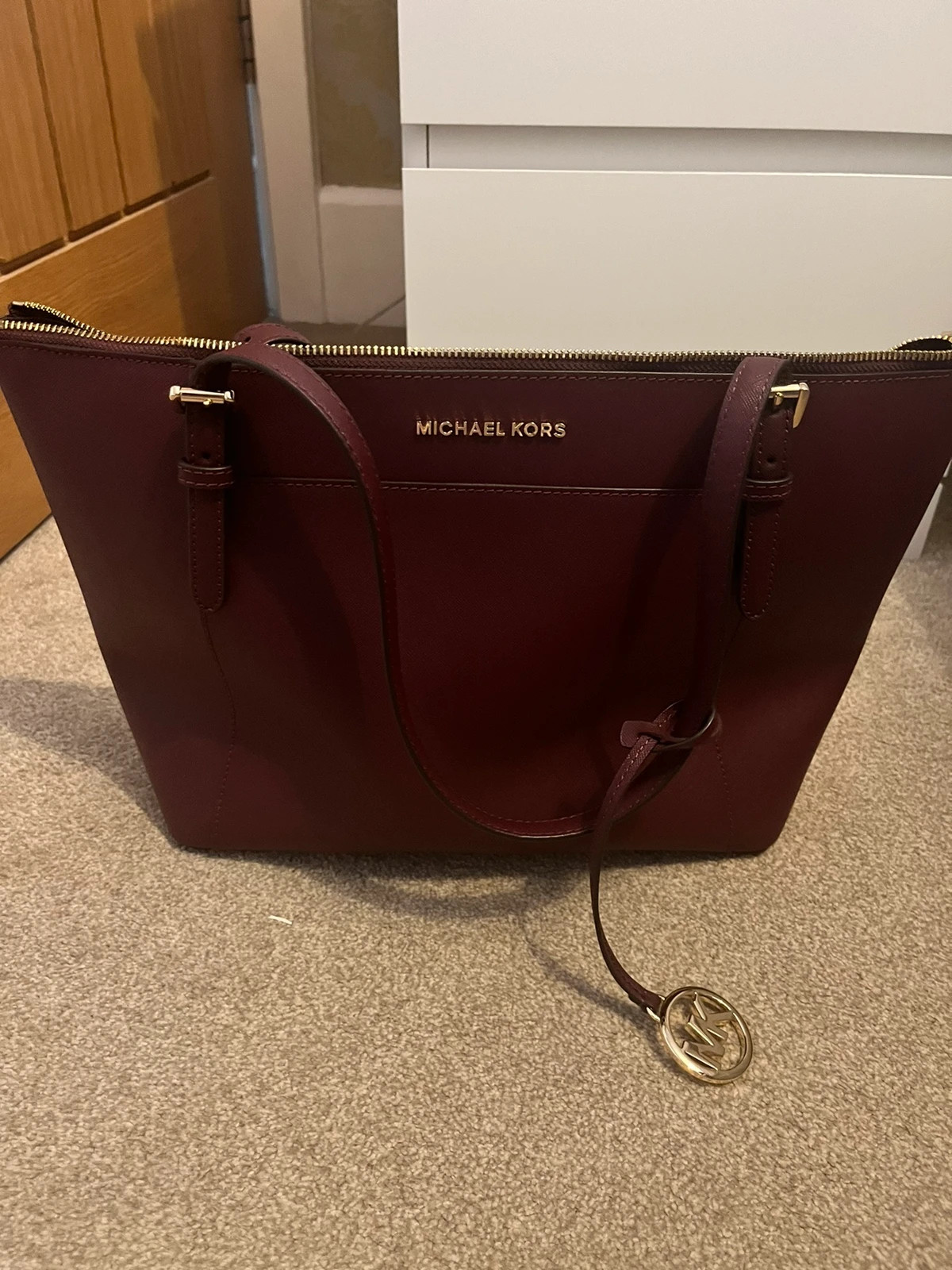 Burgundy michael kors handbag hotsell