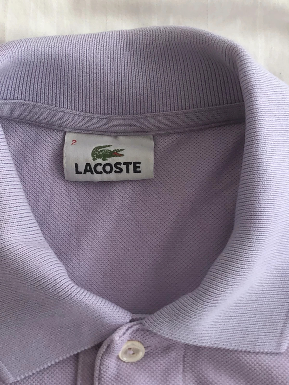 Polo lacoste 2025 taille 2