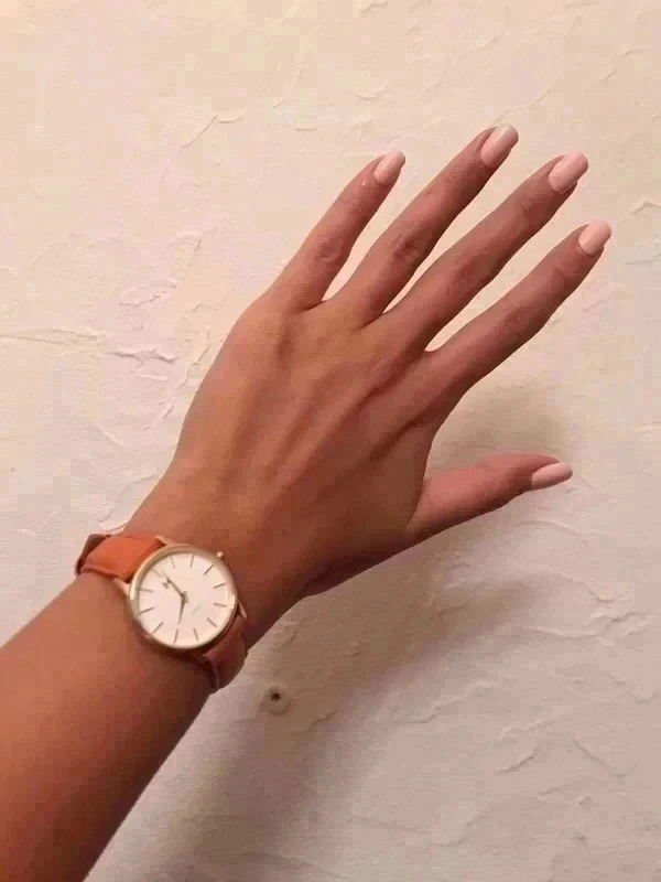 Montre en cuir orange et dor e MVMT Vinted