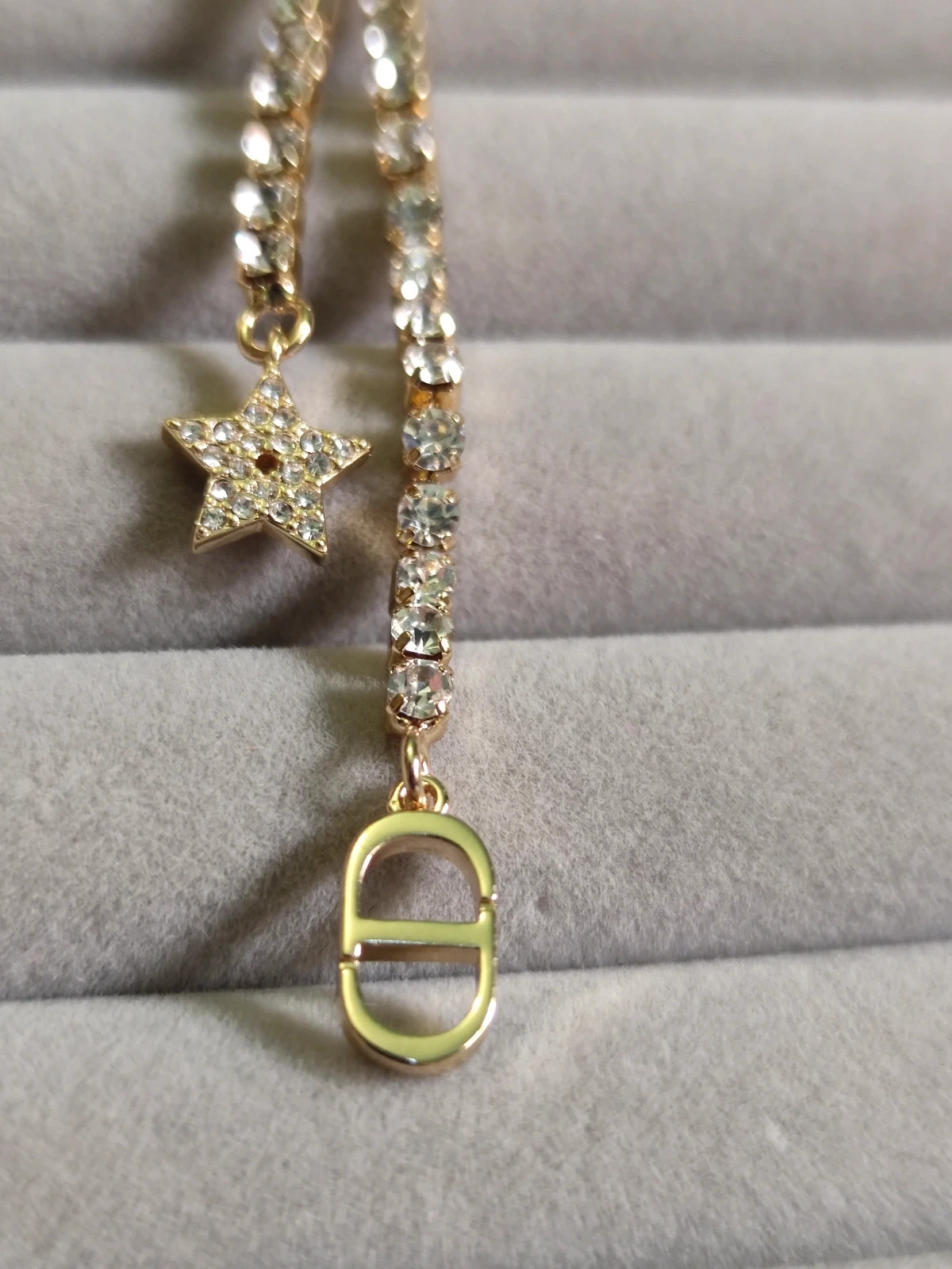 Christian Dior Tribales Stud Pierced Earring with Faux Pearls and star CD  charms
