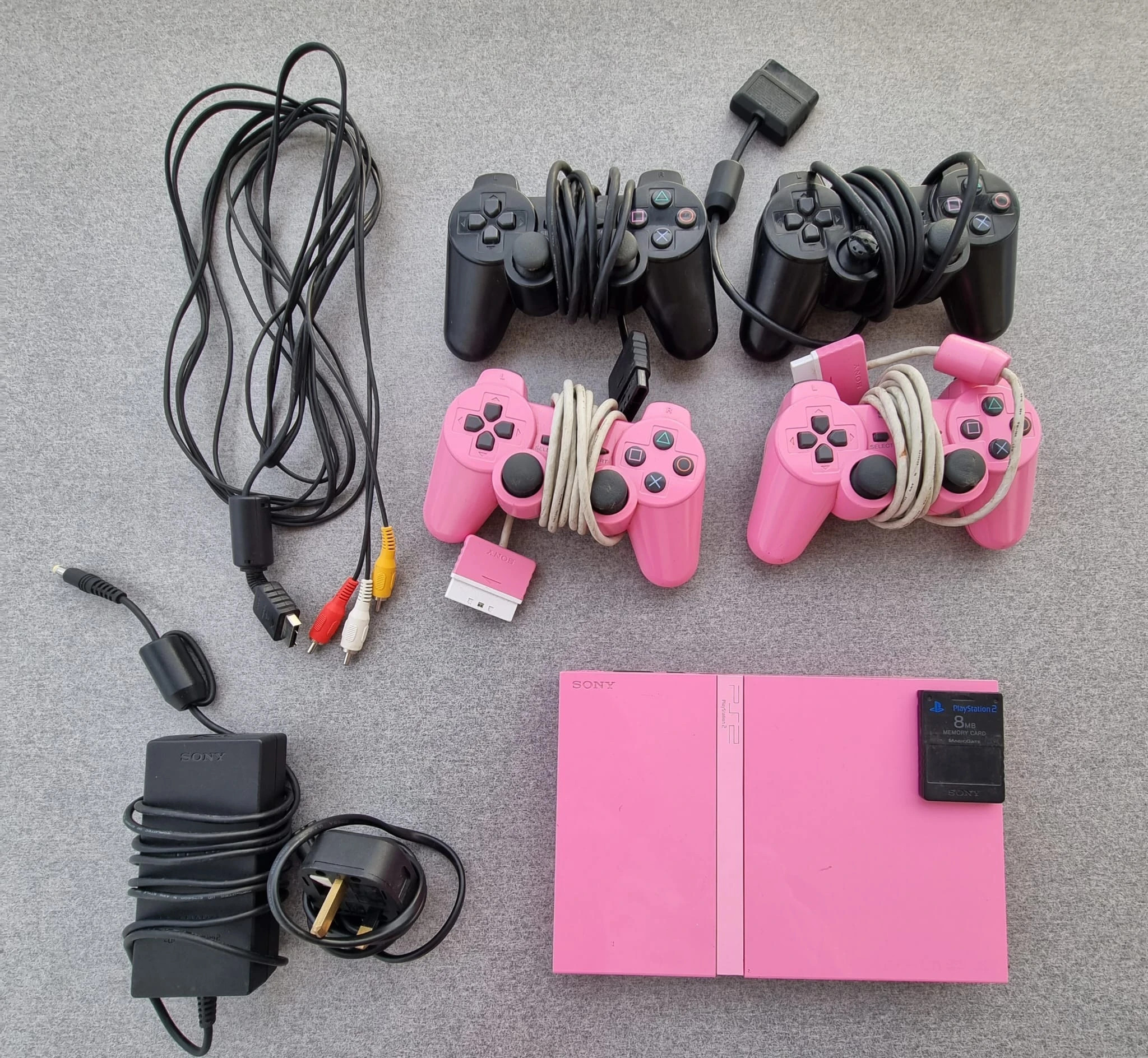 Consola Playstation 2 slim rosa con mando memory card cables PS2